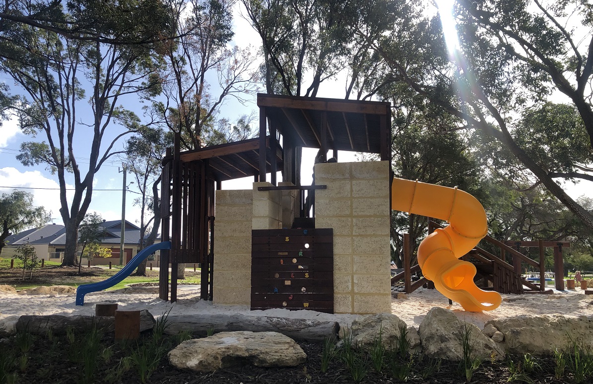 Explore the two level cubby and nature play elements at Dick Lawrence Play Space Beaconsfield