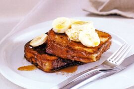 french toast with banana and maple syrup