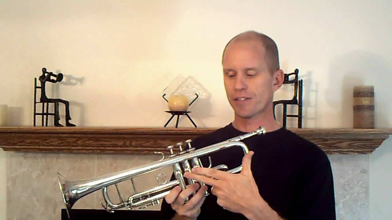 how is a trumpet played