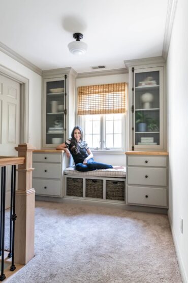 window seat with bookshelves